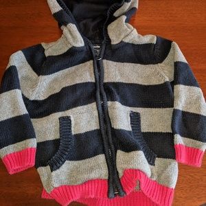 Blue and gray striped hoodie with red trim